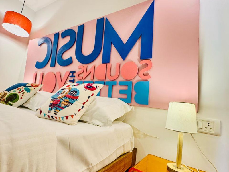 Mela by Half,a A Pop Art Haven by the Beach